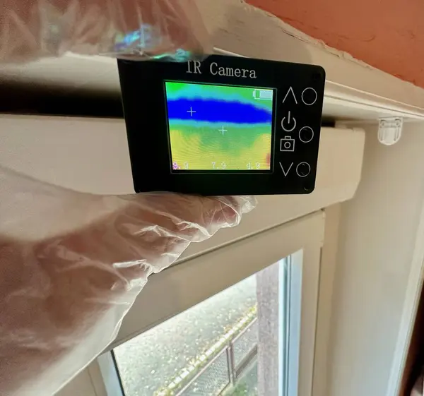 Infrared Thermal Imaging Camera Detecting Heat Loss in a Residential Setting