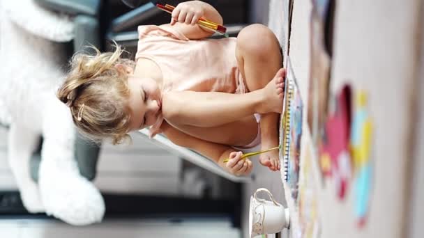 Little Girl Sits Floor Home Draws Paints Brushes Coloring Book — Vídeo de stock