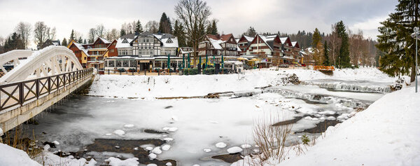 Spindleruv Mlyn, Czech republic - December 20, 2022: Architecture of Spindleruv Mlyn in winter. Mountain town near Hradec Kralove, Czech republic. High quality photo