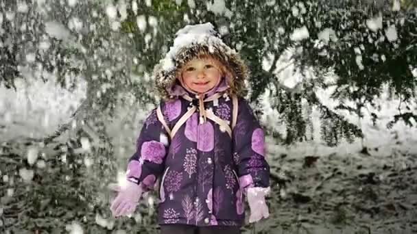 Snow Falling Little Girl Slow Motion Happy Child Rejoices Winter — Stockvideo