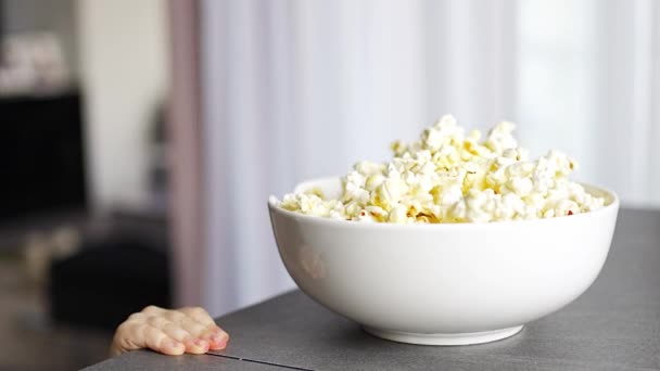 Little Girl Eating Popcorn Home Kitchen Focus Hand Taking Popcorn — Stock videók