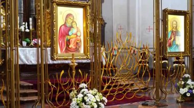 Prague, Czech republic - October 8, 2022: Interior of church Cathedral of St. Clement. Ceremony with Icons in the interior of church. High quality 4k footage