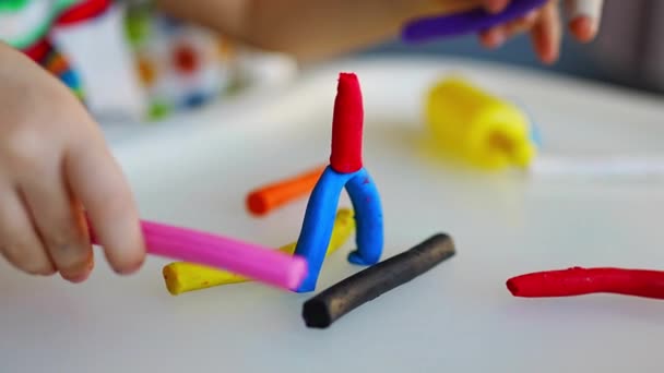 Little Girl Plays Multi Colored Plasticine Creates Different Shapes High — Video Stock