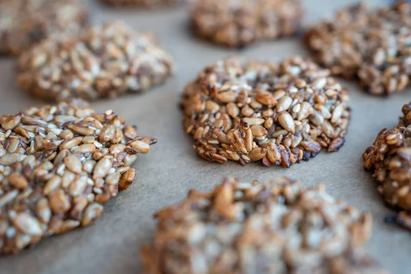 Vegan cookies made of banana and different seeds, photographed with natural light. High quality photo