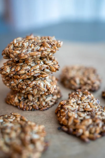 Vegan cookies made of banana and different seeds, photographed with natural light. High quality photo