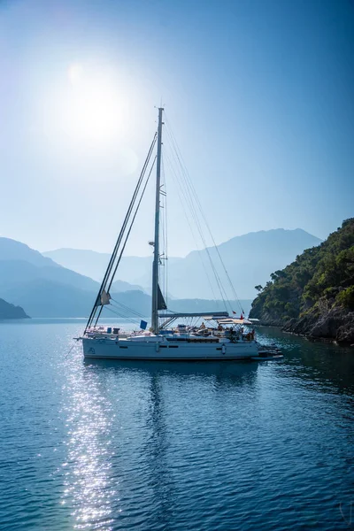 stock image Fethiye, Turkey - June 6, 2023: A coastal scene at Gemiler Island or St. Nicholas Island with mooring yachts near Fethiye, Turkey. High quality photo