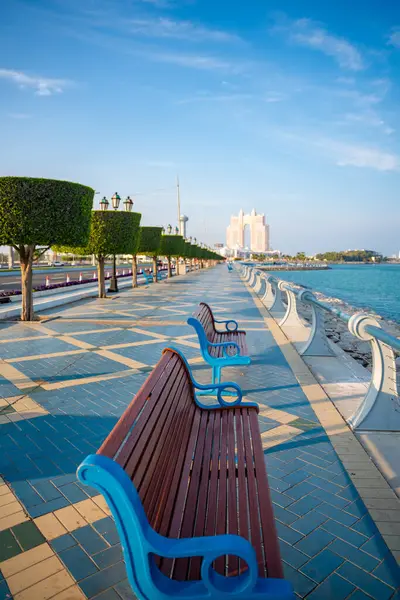 stock image Abu Dhabi, UAE - Desember 4, 2023: Embankment with benches and overlooking Marine Mall . High quality photo