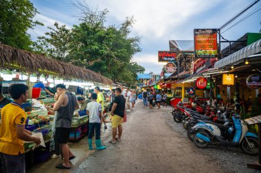 Phuket, Thailand - December 19, 2023: Trade in seafood at the market in Rawai, tourists buy seafood at the seafood market. High quality photo