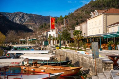 A lot of boat on Crnojevic river in small town near Skadar lake in Montenegro in winter time. High quality photo clipart