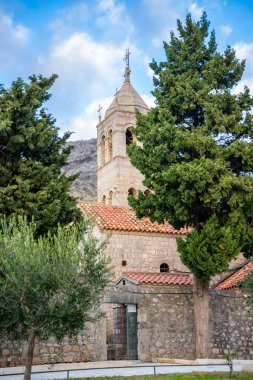 Orthodox Rezevici monastery near the Adriatic sea in Montenegro. High quality photo clipart