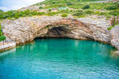 Blue Cave or grotto in Lustica Bay, Montenegro. High quality photo.  clipart