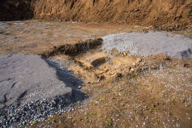 Plaka yükü test sonuçları statik basınç uygulamasından sonra toprak yüzeyinde görülebilir. Temel uygunluk ve yük taşıma kapasitesi için yer araştırması. Yüksek kalite fotoğraf