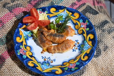 Italian Finger food Shortbread crusted prawns with pistachio powder and cheese