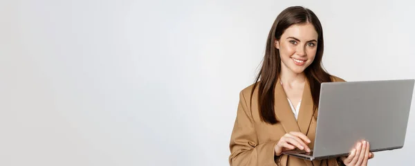 Portrait Corporate Woman Working Laptop Smiling Looking Assertive White Background — Fotografia de Stock