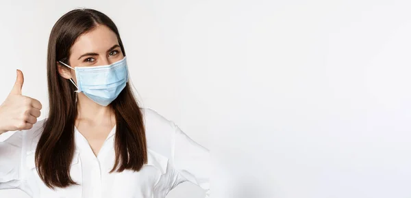 Close Portrait Face Woman Medical Mask Smiling Showing Thumbs Standing — Stock Photo, Image