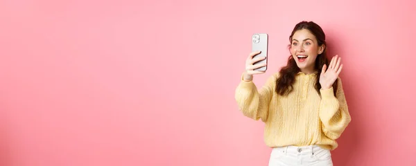 Cheerful Girl Video Chatting Smartphone Waving Hand Phone Camera Smiling — Stock Photo, Image