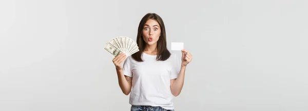 Amused Brunette Girl Looking Excited Holding Money Credit Card Standing — Stock Photo, Image