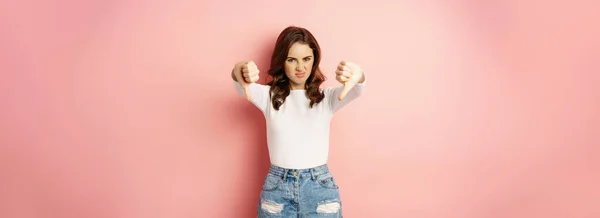 Portrait Young Woman Showing Thumbs Express Dislike Disappointed Standing Pink — Stock Photo, Image
