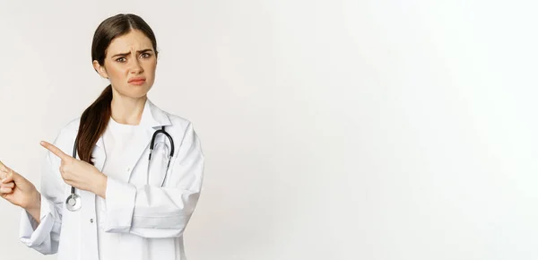 Sad Disappointed Female Doctor Frowning Frustrated Pointing Fingers Complaining Standing — Stok fotoğraf