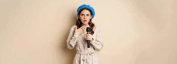 Image Insecure Young Woman Standing Mic Microphone Looking Shocked Worried —  Fotos de Stock