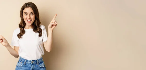 Happy Authentic Girl Smiling Pointing Fingers Sideways Showing Left Right — 图库照片