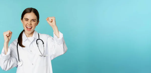 Enthusiastic Doctor Woman Rejoicing Winning Celebrating Achieve Goal Standing White — Stok fotoğraf