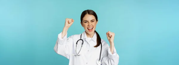 Enthusiastic Doctor Woman Rejoicing Winning Celebrating Achieve Goal Standing White — Fotografia de Stock