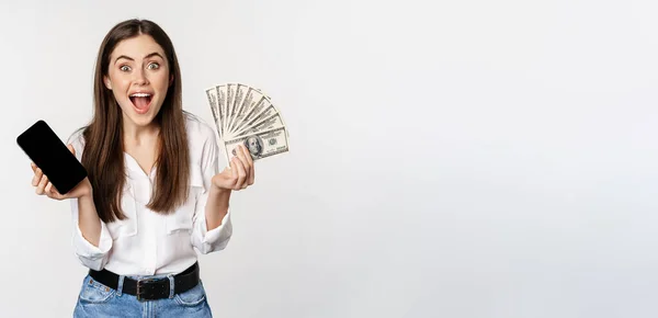 Enthusiastic Young Woman Winning Money Showing Smartphone App Interface Cash — Foto de Stock