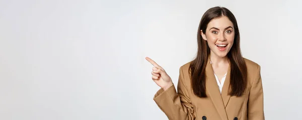 Portrait Businesswoman Pointing Finger Left Showing Corporate Banner Logo Standing — 图库照片