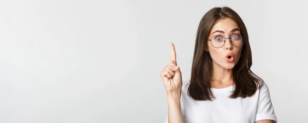 Close Smart Cute Girl Glasses Raising Finger Eureka Gesture Think — Stock Photo, Image