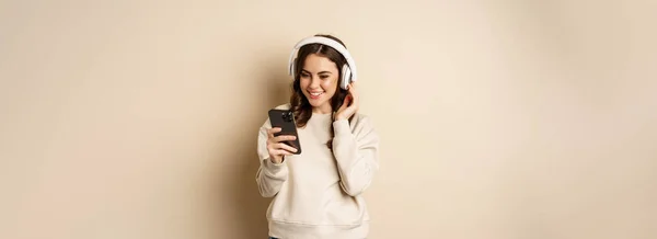 Beautiful Young Woman Looking Video Smartphone Listening Music Headphones Standing — Photo