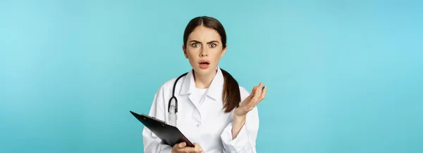 Shocked Woman Doctor Reacting Worried Frustrated Camera Hear Smth Strange — Stockfoto
