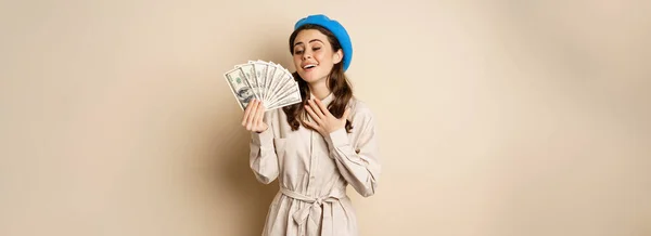 Stylish Young Woman Holding Money Cash Dollars Smiling Posing Satisfied — Photo