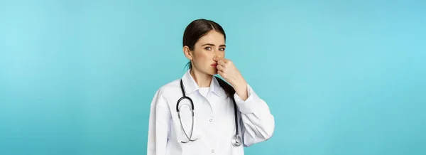 Woman Doctor Dislike Shut Nose Bad Smell Reek Standing Torquoise — Fotografia de Stock