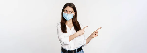 Portrait Corporate Woman Face Medical Mask Pointing Fingers Left Showing — Stockfoto