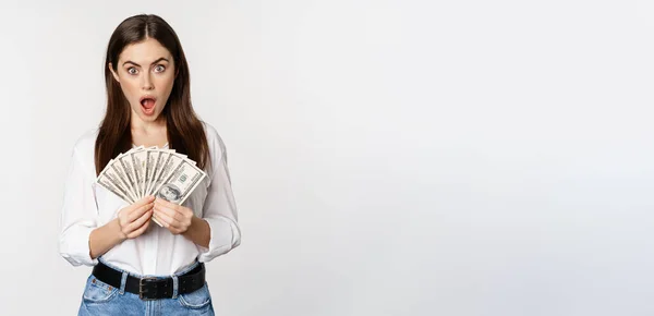 Portrait Beautiful Woman Holding Money Cash Smiling Pleased Standing White — Φωτογραφία Αρχείου