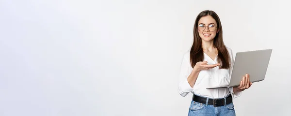 Portrait Woman Glasses Holding Laptop Pointing Screen Showing Her Work — 图库照片