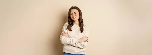 Beautiful Young Brunette Woman Posing Happy Beige Background Smiling Camera — 图库照片