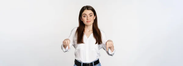 Doubtful Cute Girl Shrugging Unsure Smiling Pointing Fingers Standing White — Stockfoto
