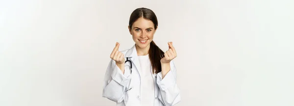 Woman Doctor Showing Finger Hearts Smiling Care Standing Uniform White — Stock fotografie