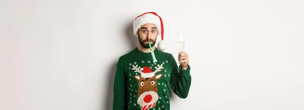 Christmas Holidays Concept Funny Guy Santa Hat Blowing Party Whistle — Stock Photo, Image