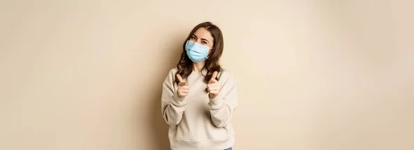 Hey You Congrats Smiling Beautiful Woman Medical Face Mask Pointing — Stockfoto