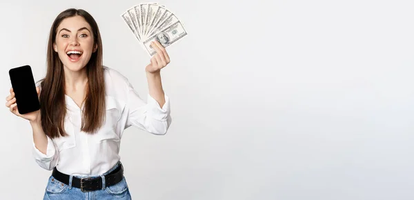 Enthusiastic Young Woman Winning Money Showing Smartphone App Interface Cash — Foto de Stock