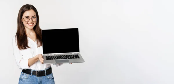Portrait Smiling Woman Glasses Showing Laptop Screen Demonstrating Company Website — Zdjęcie stockowe