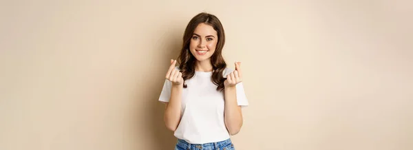 Cute Young Woman Showing Finger Hearts Sign Smiling Express Care — 图库照片