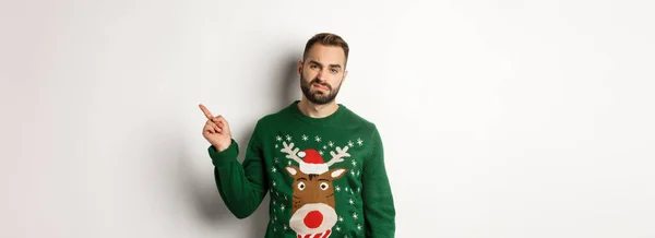Winter Holidays Christmas Displeased Grumpy Guy Complaining Wearing Funny Sweater — Stock Photo, Image