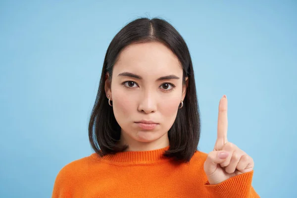 Close Serious Asian Woman Shows One Finger Stop Gesture Scolding — Stock Photo, Image