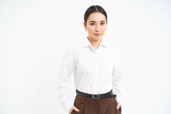 stock image Influencers and business. Confident young businesswoman with professional attitude, stands over white background.