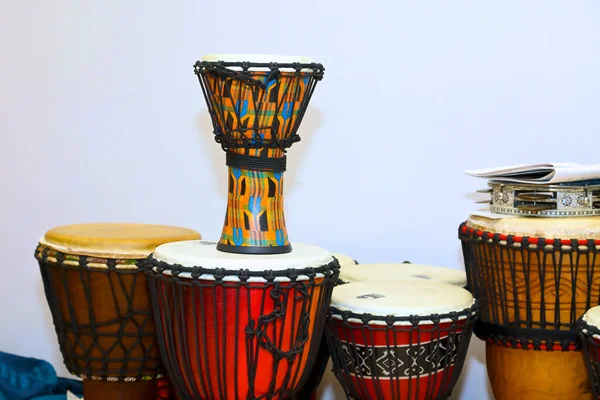 Bongo drums stacked on top of each other