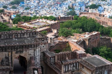 Top view of famous Mehrangarh fort, Jodhpur city in the background, as seen from top of the fort, Jodhpur, Rajasthan, India. Mehrangarh Fort is UNESCO world heritage site popular worldwide.